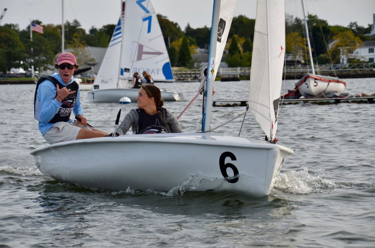 Fall Sailing teammates Jack Spillane 25 and Theo Binder 25 make use of a photo-op during an afternoon practice.
