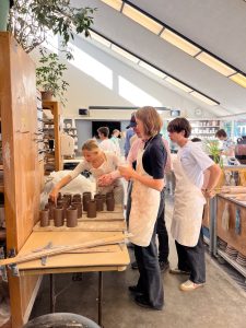 Last year's visitors from Rysensteen in the ceramics studio.